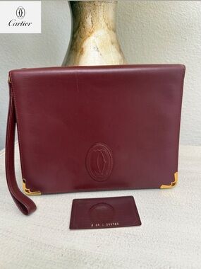 CARTIER Must Leather Bordeaux Clutch Bag